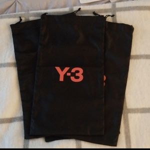 Four Y3 shoe dust bags.